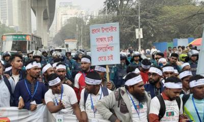 মালয়েশিয়া যেতে না পারা শ্রমিকদের যে খবর দিলেন প্রবাসী কল্যাণ সচিব